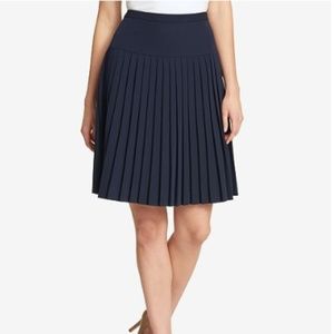 Pleated navy skirt, size 14
